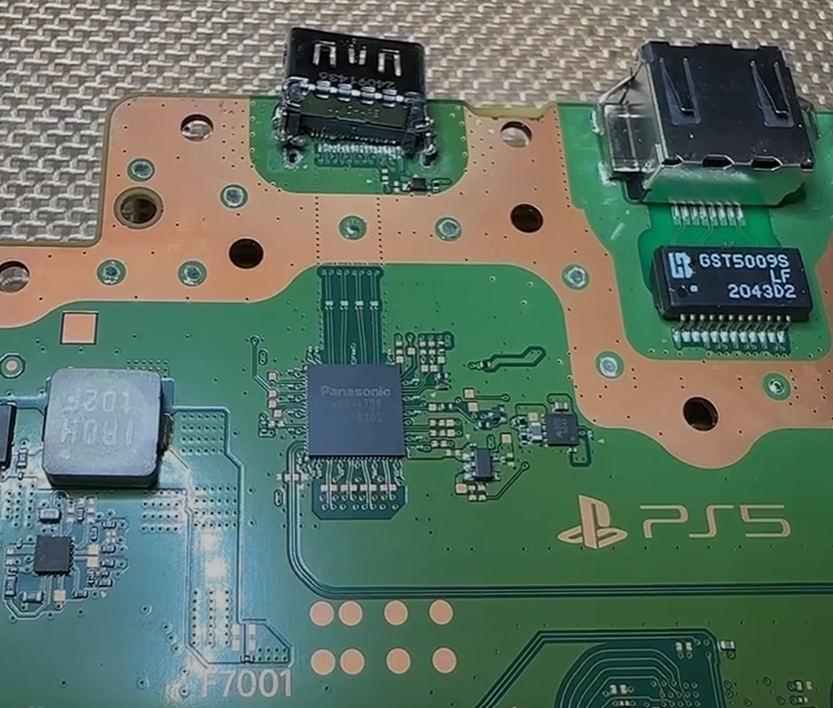 Damaged PS5 HDMI connector with bent pins and board damage