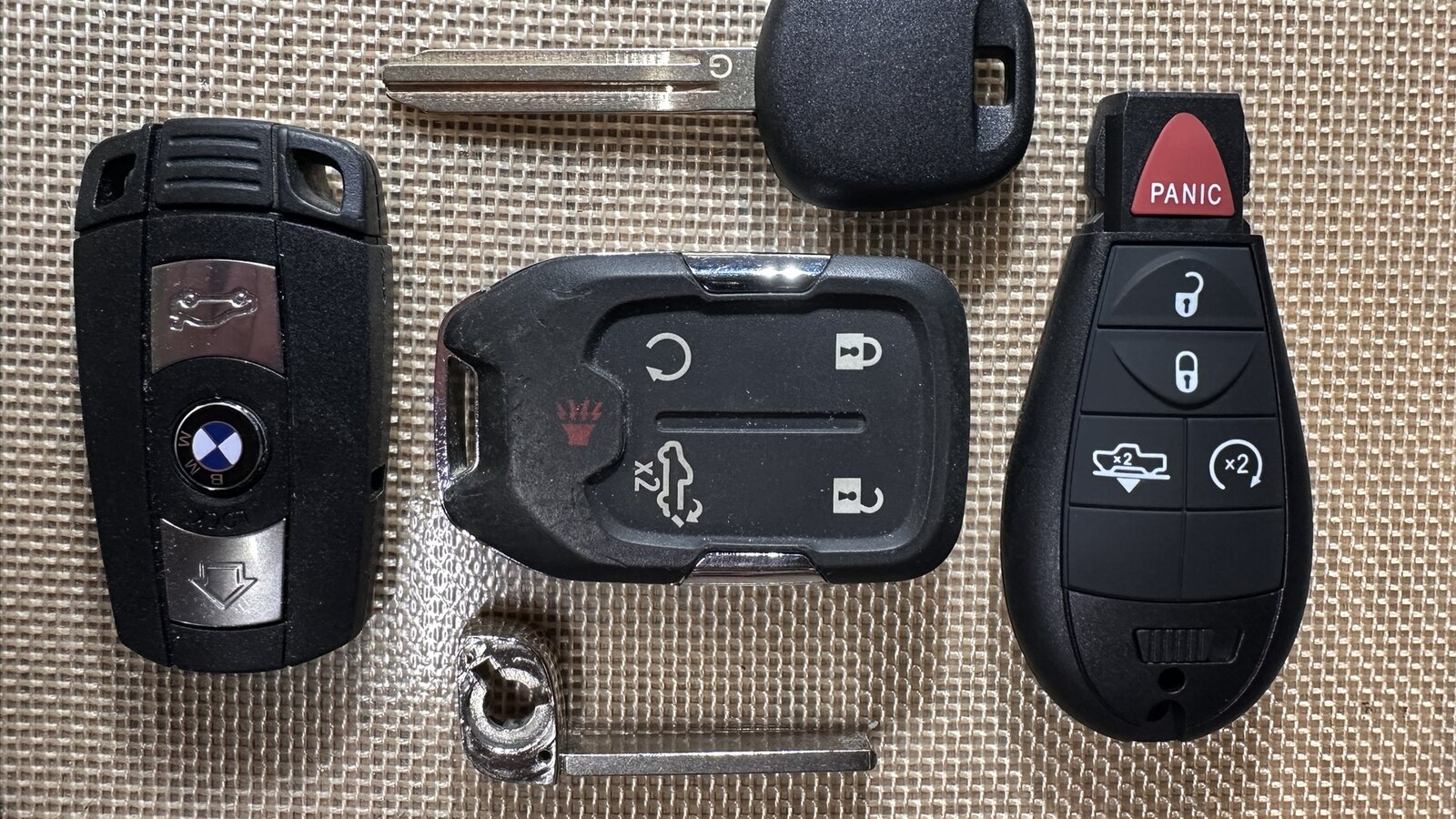 Representative automotive keys, remote fobs, smart keys, and emergency key blades